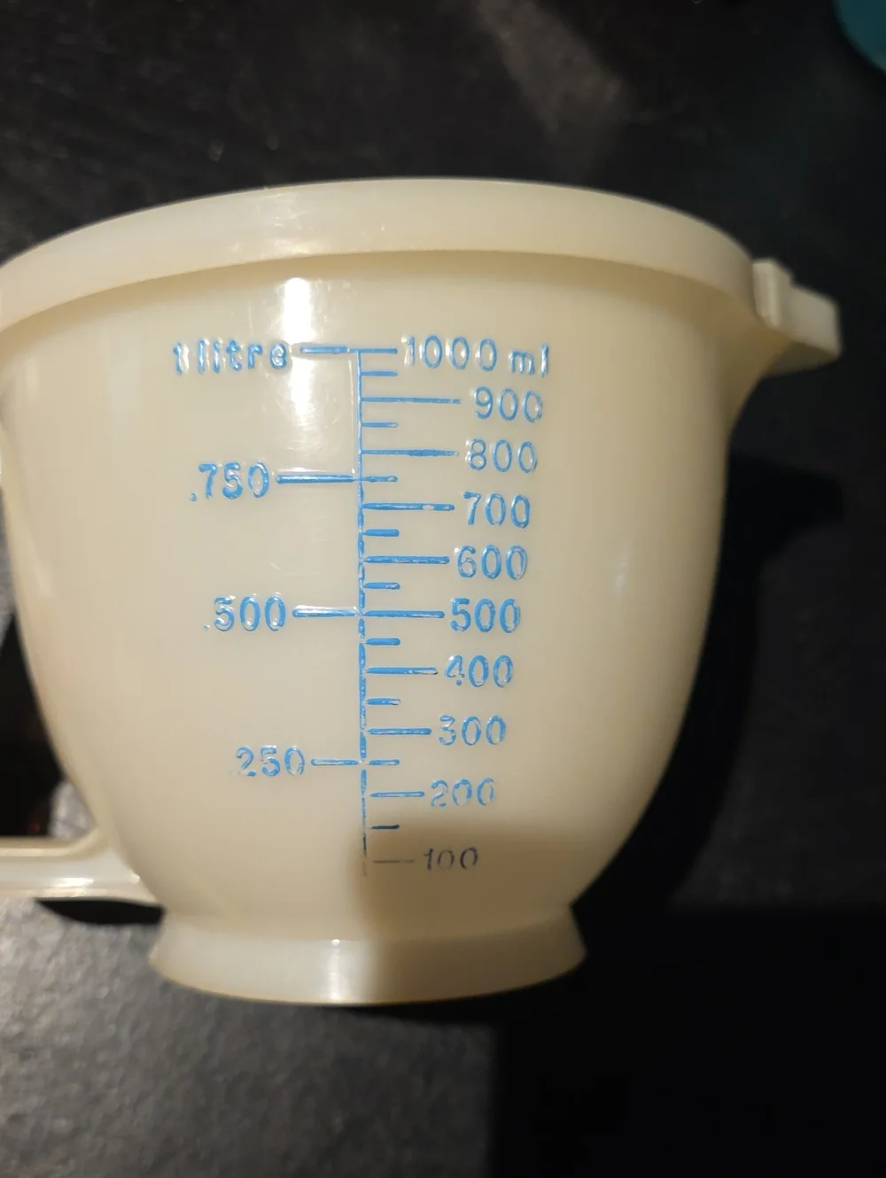 Plastic Measuring Cup with Blue Markings